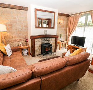The welcoming living room at Old Hall Cottages in Staffordshire